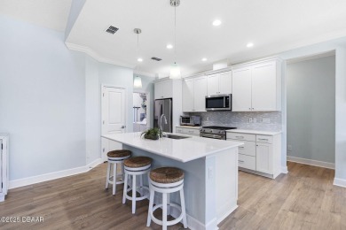 Tropical Charm Meets Smart Sophistication in this Upgraded on LPGA International Golf Course in Florida - for sale on GolfHomes.com, golf home, golf lot