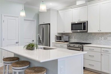 Tropical Charm Meets Smart Sophistication in this Upgraded on LPGA International Golf Course in Florida - for sale on GolfHomes.com, golf home, golf lot