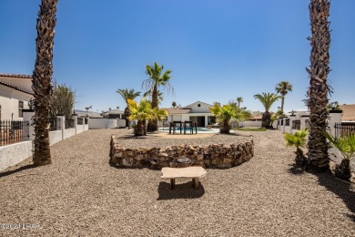 Welcome to 2341 Green Place, an exquisitely remodeled four on London Bridge Golf Course in Arizona - for sale on GolfHomes.com, golf home, golf lot