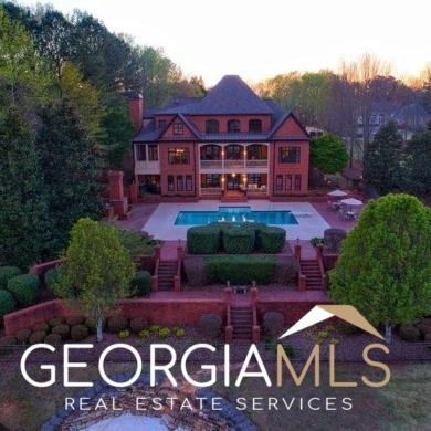 This custom-built European lakefront home is located in Oak on Oak Mountain Championship Golf Club in Georgia - for sale on GolfHomes.com, golf home, golf lot