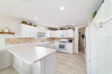 This well-maintained 3 bedroom, 2 bath, CYPRESS model in the on The Links of Spruce Creek in Florida - for sale on GolfHomes.com, golf home, golf lot