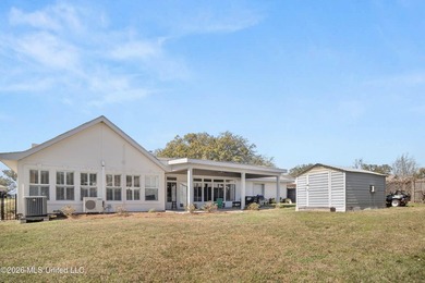 Waterfront living in one of Biloxi's most desirable and peaceful on Sunkist Country Club, Inc. in Mississippi - for sale on GolfHomes.com, golf home, golf lot