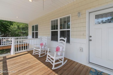 Welcome to 109 SW 17th Street, a beautiful home on pilings with on Founders Club At St. James Plantation in North Carolina - for sale on GolfHomes.com, golf home, golf lot