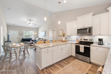 Welcome to 109 SW 17th Street, a beautiful home on pilings with on Founders Club At St. James Plantation in North Carolina - for sale on GolfHomes.com, golf home, golf lot