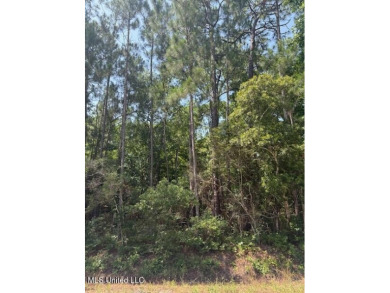 This lot is the perfect canvas for your dream home in the on Pass Christian Isles Golf Club in Mississippi - for sale on GolfHomes.com, golf home, golf lot
