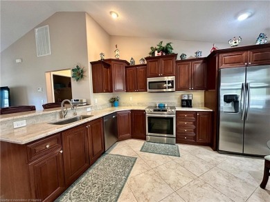 Welcome to your dream home in the serene community of Placid on Placid Lakes Country Club in Florida - for sale on GolfHomes.com, golf home, golf lot