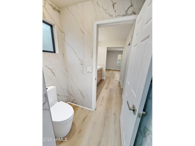 Completely remodeled in 2025 with a brand-new interior, this on Fountain of the Sun Country Club in Arizona - for sale on GolfHomes.com, golf home, golf lot