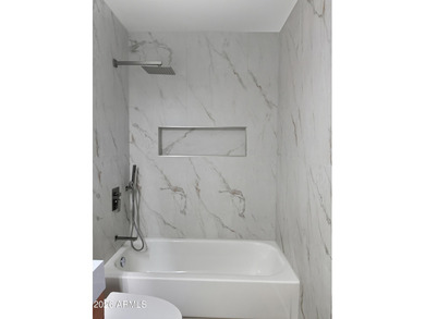 Completely remodeled in 2025 with a brand-new interior, this on Fountain of the Sun Country Club in Arizona - for sale on GolfHomes.com, golf home, golf lot