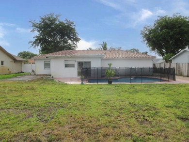 3/2 1 Car Garage Pool Home! Enjoy the large private backyard on Southwinds Golf Course in Florida - for sale on GolfHomes.com, golf home, golf lot