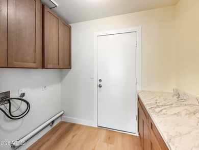 Completely remodeled in 2025 with a brand-new interior, this on Fountain of the Sun Country Club in Arizona - for sale on GolfHomes.com, golf home, golf lot