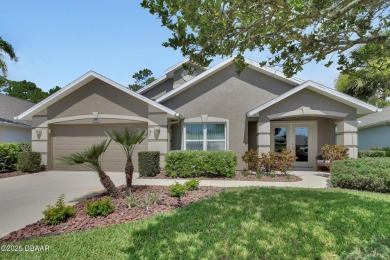 Discover this impeccably maintained pool home located on the on Plantation Bay Golf and Country Club in Florida - for sale on GolfHomes.com, golf home, golf lot
