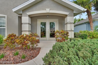 Discover this impeccably maintained pool home located on the on Plantation Bay Golf and Country Club in Florida - for sale on GolfHomes.com, golf home, golf lot