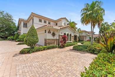 Behind a breathtaking guard-gated entrance, manicured on Parkland Golf Club in Florida - for sale on GolfHomes.com, golf home, golf lot
