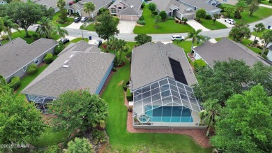 Discover this impeccably maintained pool home located on the on Plantation Bay Golf and Country Club in Florida - for sale on GolfHomes.com, golf home, golf lot