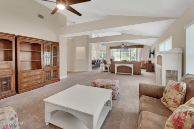 Discover this impeccably maintained pool home located on the on Plantation Bay Golf and Country Club in Florida - for sale on GolfHomes.com, golf home, golf lot