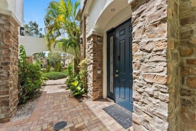 Behind a breathtaking guard-gated entrance, manicured on Parkland Golf Club in Florida - for sale on GolfHomes.com, golf home, golf lot