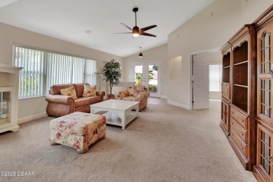Discover this impeccably maintained pool home located on the on Plantation Bay Golf and Country Club in Florida - for sale on GolfHomes.com, golf home, golf lot