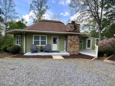 Nestled in the scenic North Georgia mountains, this charming 2 on White Path Golf Club in Georgia - for sale on GolfHomes.com, golf home, golf lot
