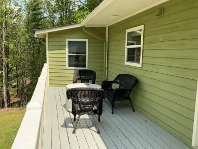 Nestled in the scenic North Georgia mountains, this charming 2 on White Path Golf Club in Georgia - for sale on GolfHomes.com, golf home, golf lot