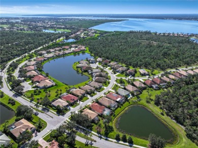Sited on a quiet cul-de-sac abutting a tranquil pond, this on Riverwood Golf Club in Florida - for sale on GolfHomes.com, golf home, golf lot