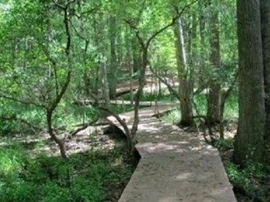 This spacious 0.57-acre homesite is beautifully wooded and on The Golf Club At Cedar Creek in South Carolina - for sale on GolfHomes.com, golf home, golf lot