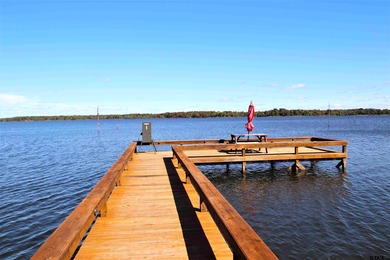 This exceptional 4,835 square foot waterfront residence is on Links At Lands End in Texas - for sale on GolfHomes.com, golf home, golf lot