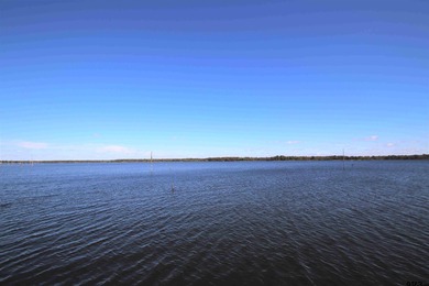 This exceptional 4,835 square foot waterfront residence is on Links At Lands End in Texas - for sale on GolfHomes.com, golf home, golf lot