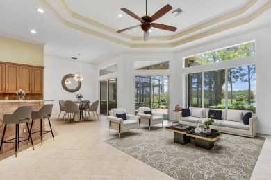 SPECTACULAR GOLF & WATER VIEWS! Nestled within the prestigious on The Legacy Golf and Tennis Club in Florida - for sale on GolfHomes.com, golf home, golf lot