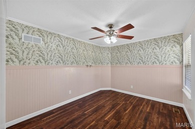 Beautiful ranch with split floor plan on nearly 1/2 an acre in a on Lake Saint Louis Par 3 in Missouri - for sale on GolfHomes.com, golf home, golf lot
