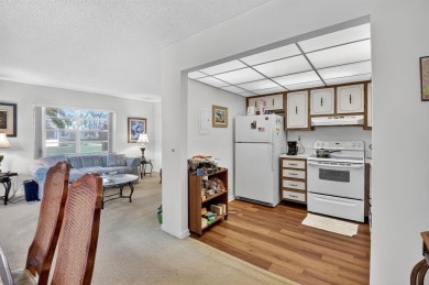 Charming, fully furnished 1st floor corner unit in Kings Point on Kings Point Golf -Flanders Way in Florida - for sale on GolfHomes.com, golf home, golf lot