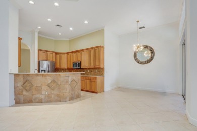 SPECTACULAR GOLF & WATER VIEWS! Nestled within the prestigious on The Legacy Golf and Tennis Club in Florida - for sale on GolfHomes.com, golf home, golf lot