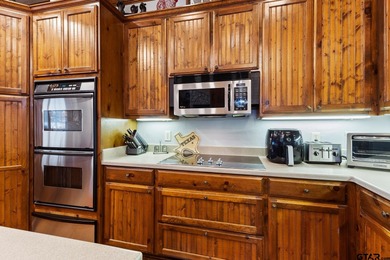 This exceptional 4,835 square foot waterfront residence is on Links At Lands End in Texas - for sale on GolfHomes.com, golf home, golf lot