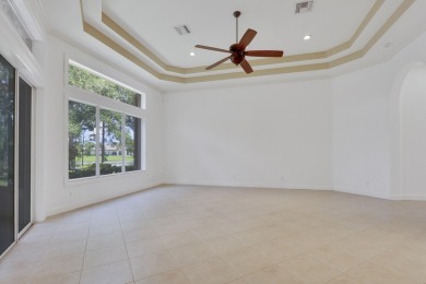 SPECTACULAR GOLF & WATER VIEWS! Nestled within the prestigious on The Legacy Golf and Tennis Club in Florida - for sale on GolfHomes.com, golf home, golf lot