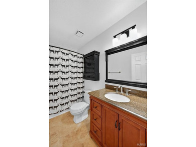 Beautiful ranch with split floor plan on nearly 1/2 an acre in a on Lake Saint Louis Par 3 in Missouri - for sale on GolfHomes.com, golf home, golf lot