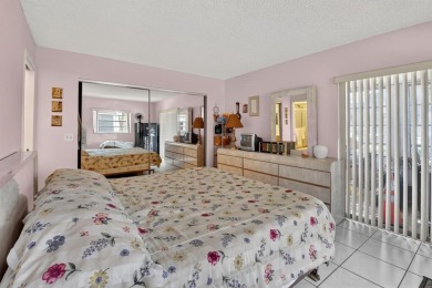 Charming, fully furnished 1st floor corner unit in Kings Point on Kings Point Golf -Flanders Way in Florida - for sale on GolfHomes.com, golf home, golf lot