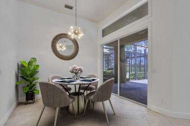 SPECTACULAR GOLF & WATER VIEWS! Nestled within the prestigious on The Legacy Golf and Tennis Club in Florida - for sale on GolfHomes.com, golf home, golf lot