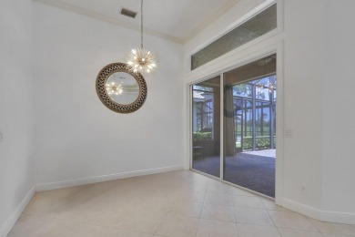 SPECTACULAR GOLF & WATER VIEWS! Nestled within the prestigious on The Legacy Golf and Tennis Club in Florida - for sale on GolfHomes.com, golf home, golf lot