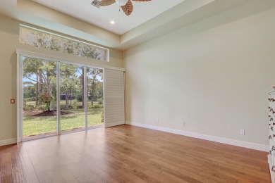 SPECTACULAR GOLF & WATER VIEWS! Nestled within the prestigious on The Legacy Golf and Tennis Club in Florida - for sale on GolfHomes.com, golf home, golf lot