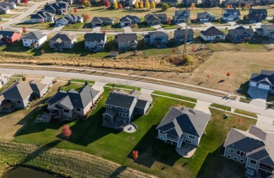 Move in ready on beautiful Otter Creek golf course. With over 3 on Otter Creek Golf Course in Iowa - for sale on GolfHomes.com, golf home, golf lot