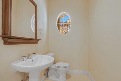 SPECTACULAR GOLF & WATER VIEWS! Nestled within the prestigious on The Legacy Golf and Tennis Club in Florida - for sale on GolfHomes.com, golf home, golf lot