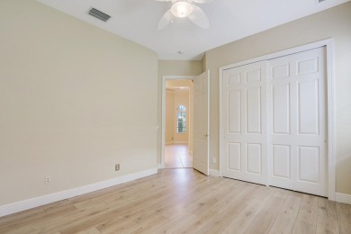 SPECTACULAR GOLF & WATER VIEWS! Nestled within the prestigious on The Legacy Golf and Tennis Club in Florida - for sale on GolfHomes.com, golf home, golf lot