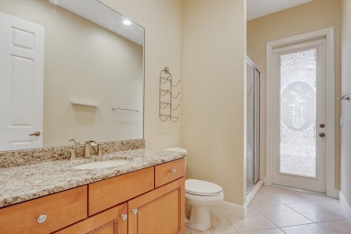 SPECTACULAR GOLF & WATER VIEWS! Nestled within the prestigious on The Legacy Golf and Tennis Club in Florida - for sale on GolfHomes.com, golf home, golf lot