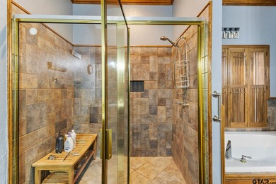 This exceptional 4,835 square foot waterfront residence is on Links At Lands End in Texas - for sale on GolfHomes.com, golf home, golf lot