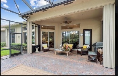 SPECTACULAR GOLF & WATER VIEWS! Nestled within the prestigious on The Legacy Golf and Tennis Club in Florida - for sale on GolfHomes.com, golf home, golf lot
