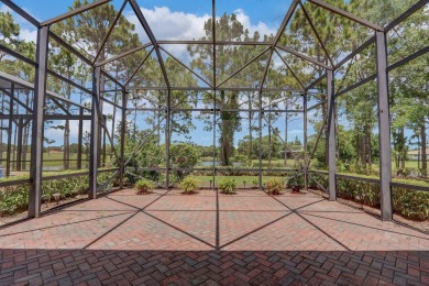 SPECTACULAR GOLF & WATER VIEWS! Nestled within the prestigious on The Legacy Golf and Tennis Club in Florida - for sale on GolfHomes.com, golf home, golf lot