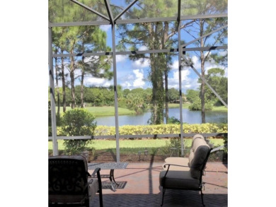 SPECTACULAR GOLF & WATER VIEWS! Nestled within the prestigious on The Legacy Golf and Tennis Club in Florida - for sale on GolfHomes.com, golf home, golf lot