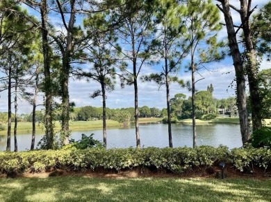 SPECTACULAR GOLF & WATER VIEWS! Nestled within the prestigious on The Legacy Golf and Tennis Club in Florida - for sale on GolfHomes.com, golf home, golf lot