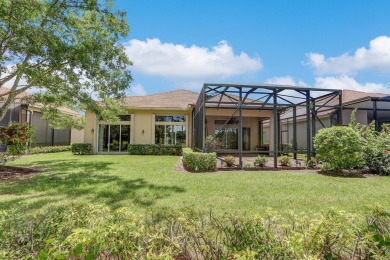 SPECTACULAR GOLF & WATER VIEWS! Nestled within the prestigious on The Legacy Golf and Tennis Club in Florida - for sale on GolfHomes.com, golf home, golf lot