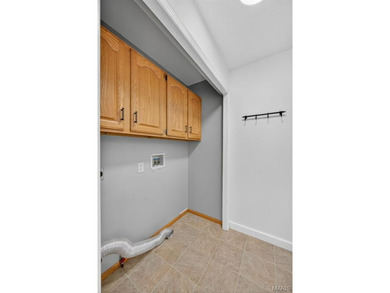 Beautiful ranch with split floor plan on nearly 1/2 an acre in a on Lake Saint Louis Par 3 in Missouri - for sale on GolfHomes.com, golf home, golf lot