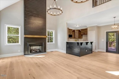 Welcome to this stunning brand new Kerr Lake home in the gated on Kerr Lake Country Club in North Carolina - for sale on GolfHomes.com, golf home, golf lot